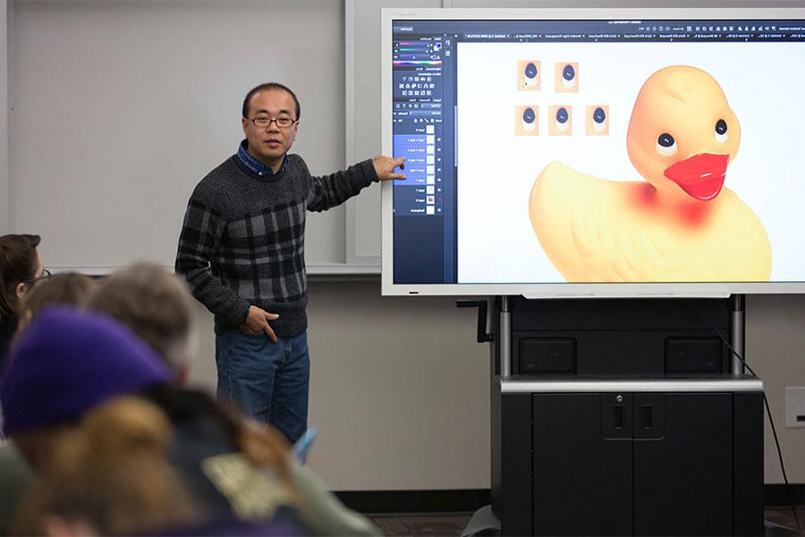 Graphic design professor explains how to use design programming on the University of Wisconsin Whitewater campus.