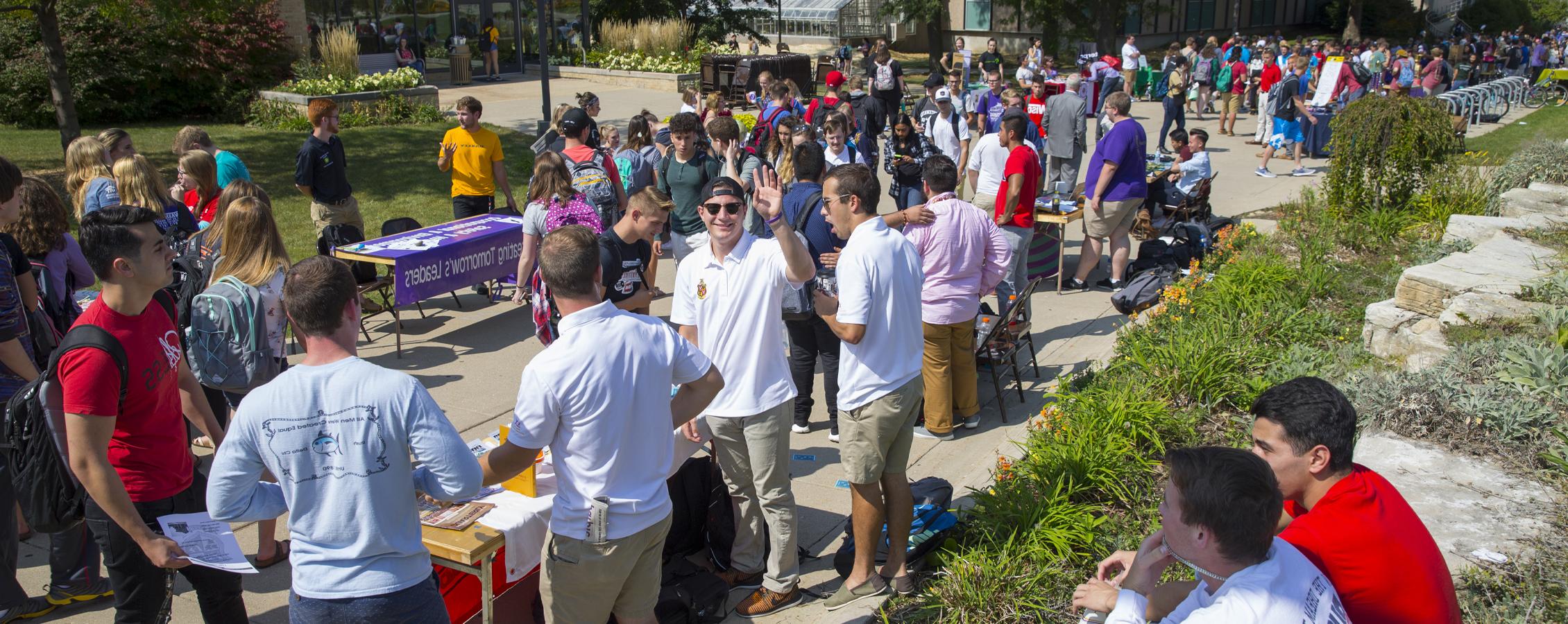 Students on the Wyman Mall during the Involvement Fair.