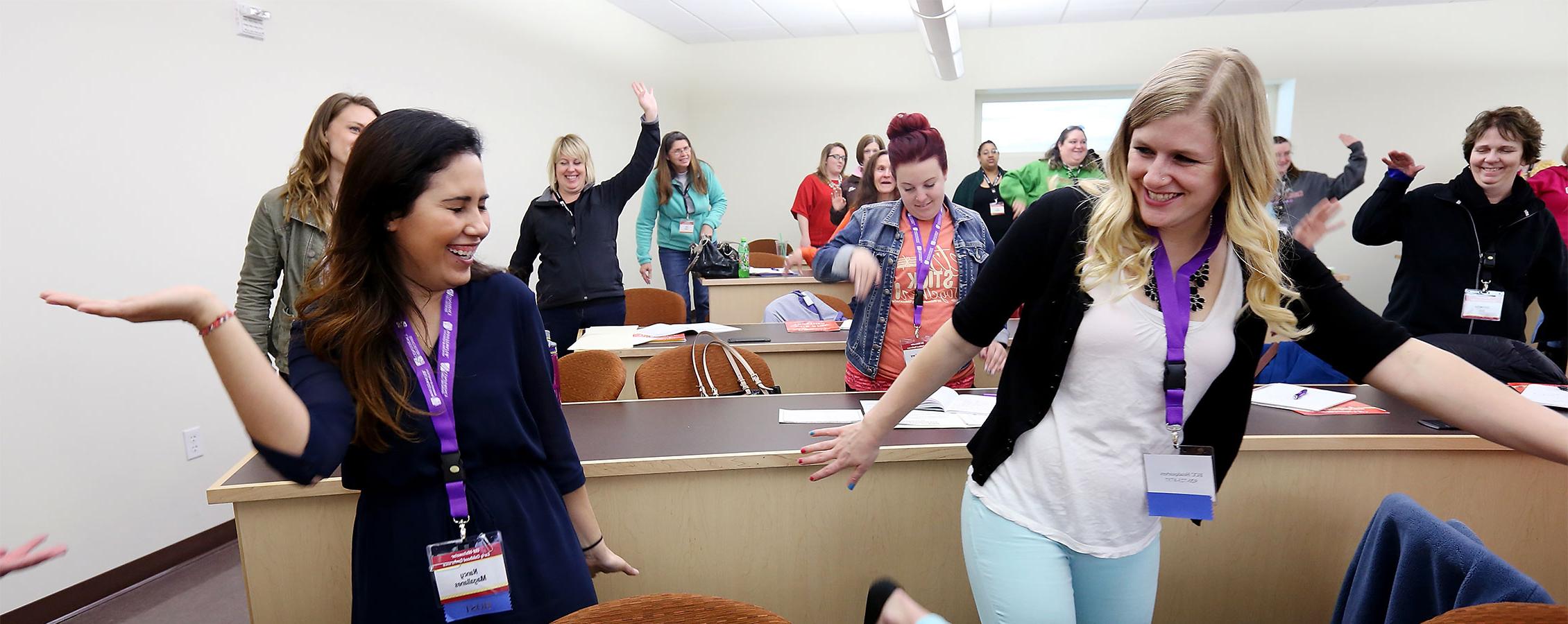 Early childhood teacher in her classroom with students