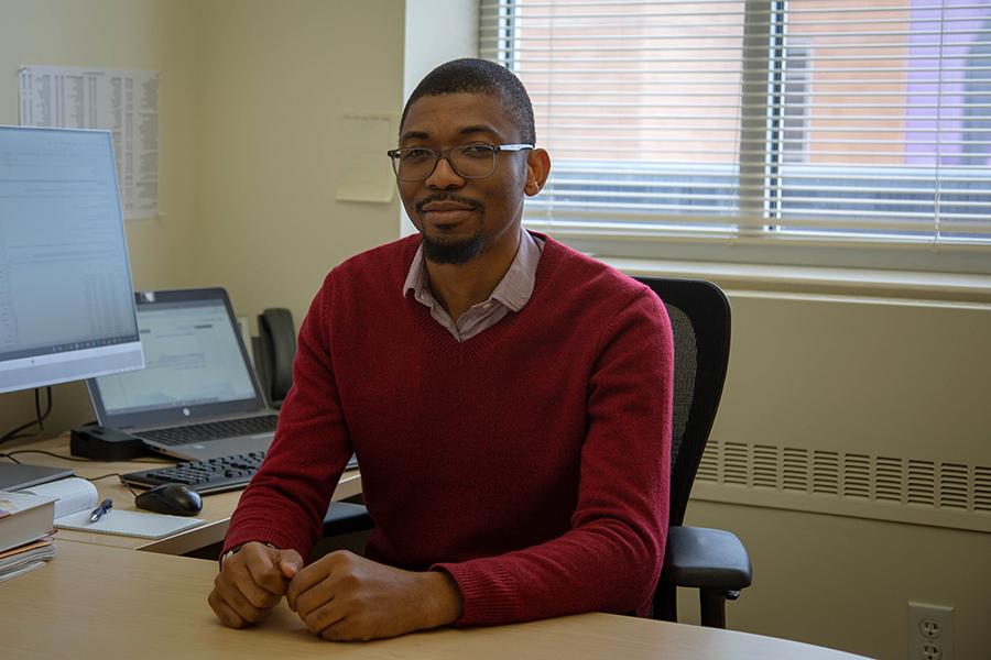 Professor Matthew Winden works with a student